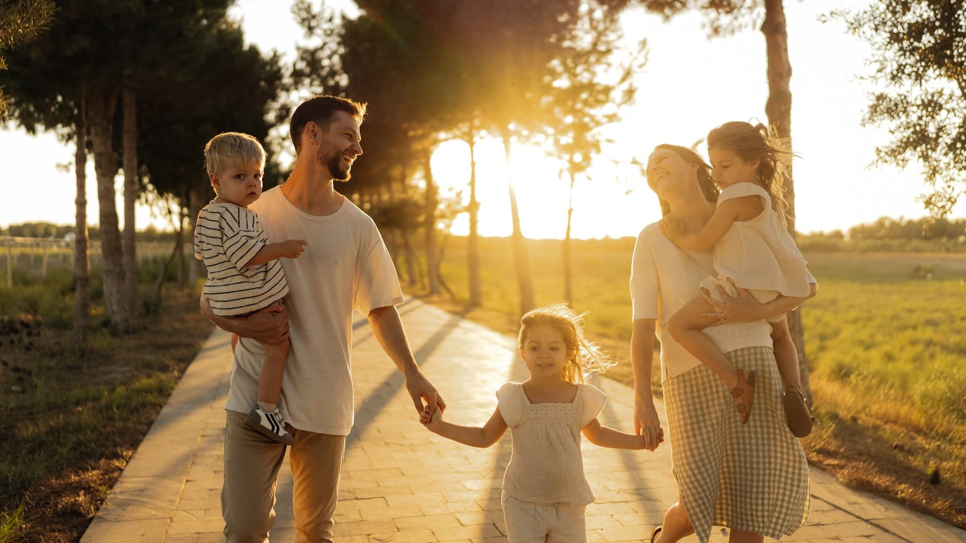 Family walking toward a bright future representing prosperity and financial security